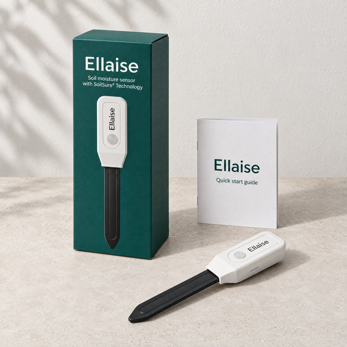 Ellaise soil moisture sensor in front of its box, with the quick start guide